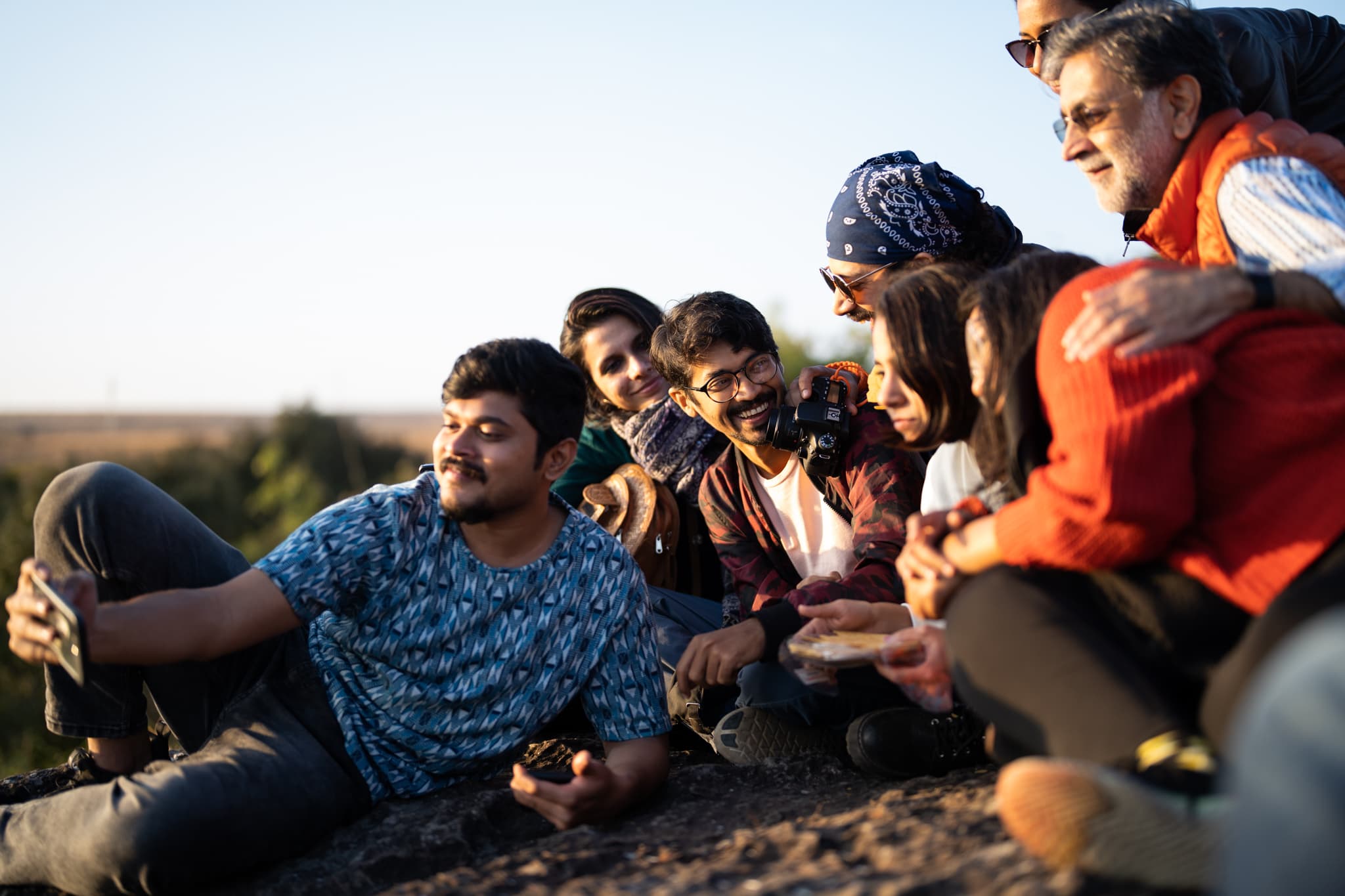 ExCo travelers gathered in conversation outdoors