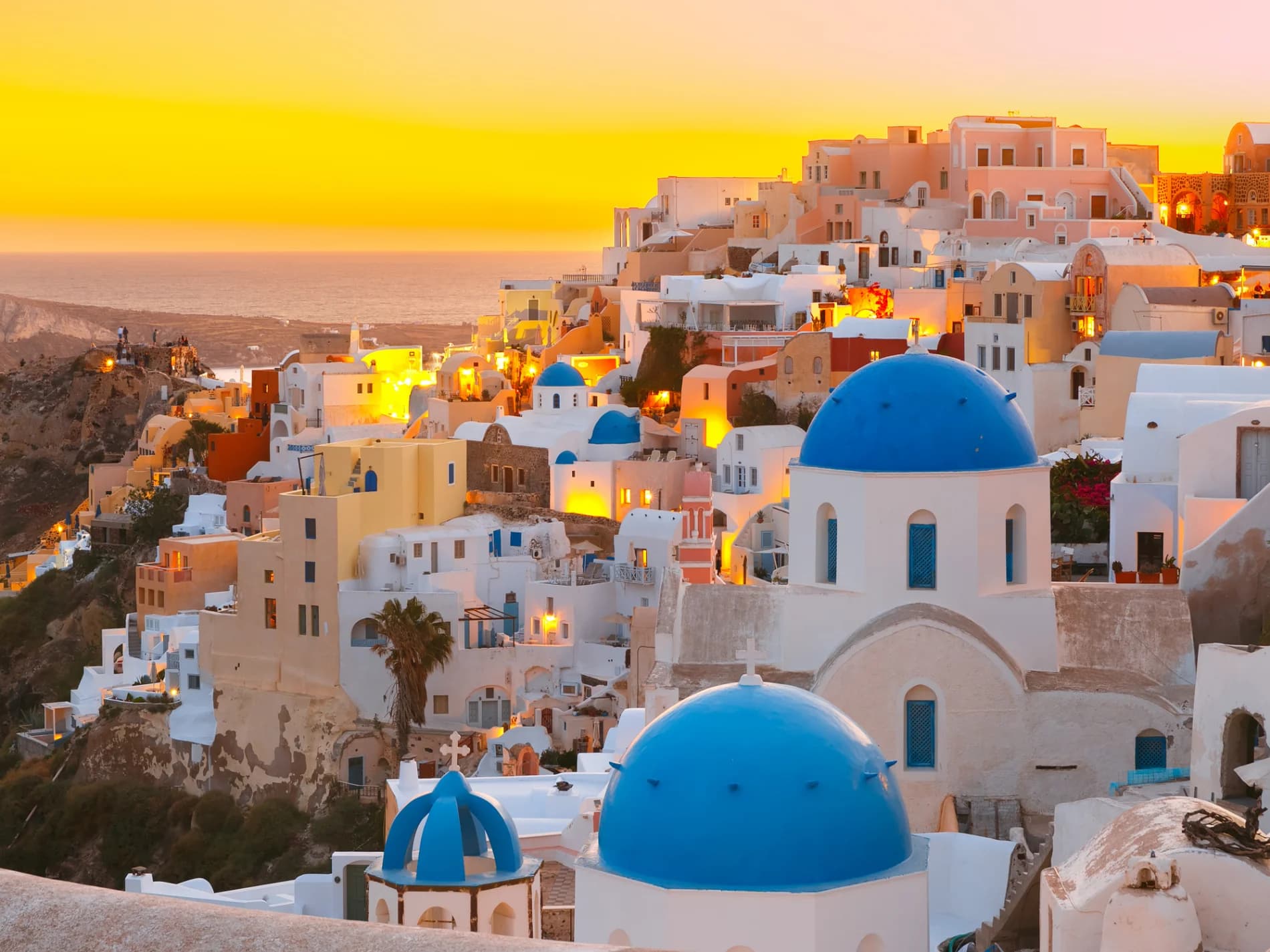 Explore Santorini and Mykonos islands' whitewashed lanes, cliffside vistas, and its coastal charm