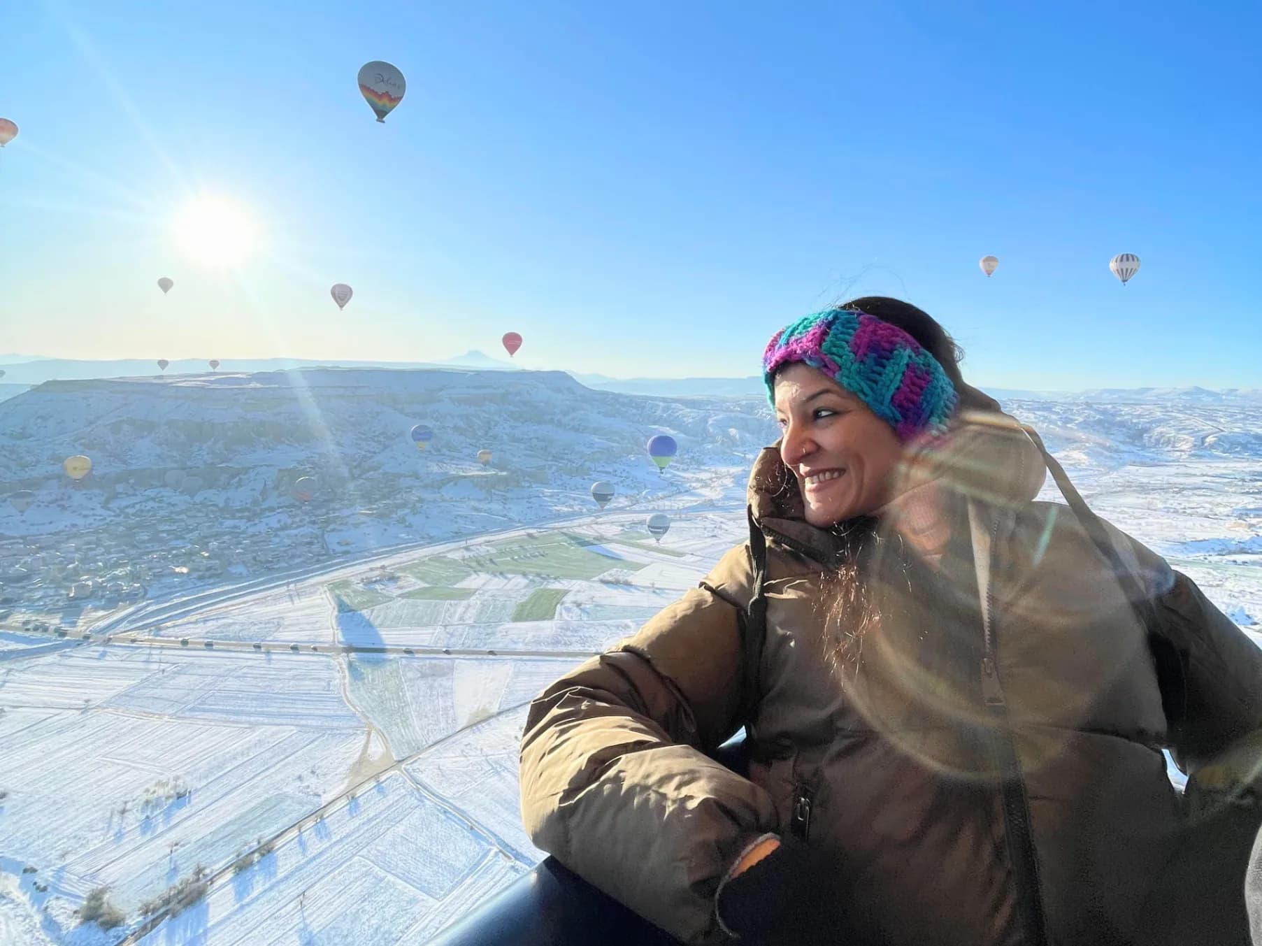 Sunrise over Cappadocia with 100+ balloons in the sky. You'll be in the basket at 5am and up in the air when the light hits the chimneys!